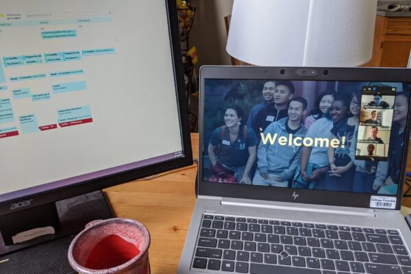Laptop On Desk With "welcome" Image