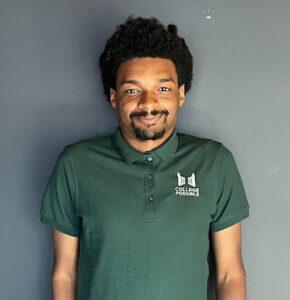 Coach Isaiah in green College Possible polo shirt