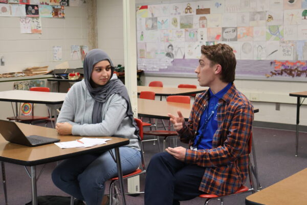 College Access Coach Chase Assisting A Student With The FAFSA.