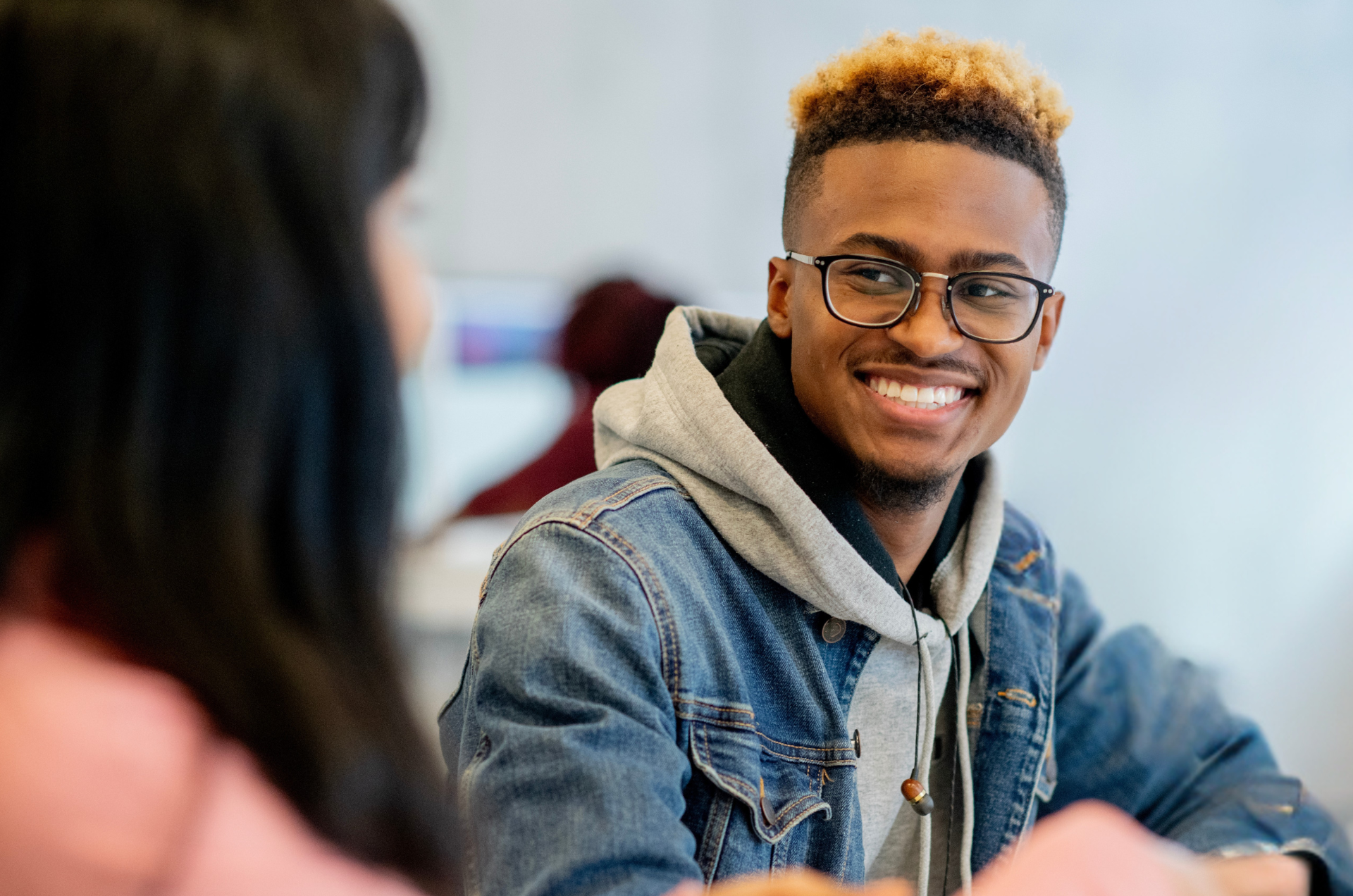 Coach working with student