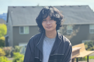 A College Possible student posing outside for a picture.