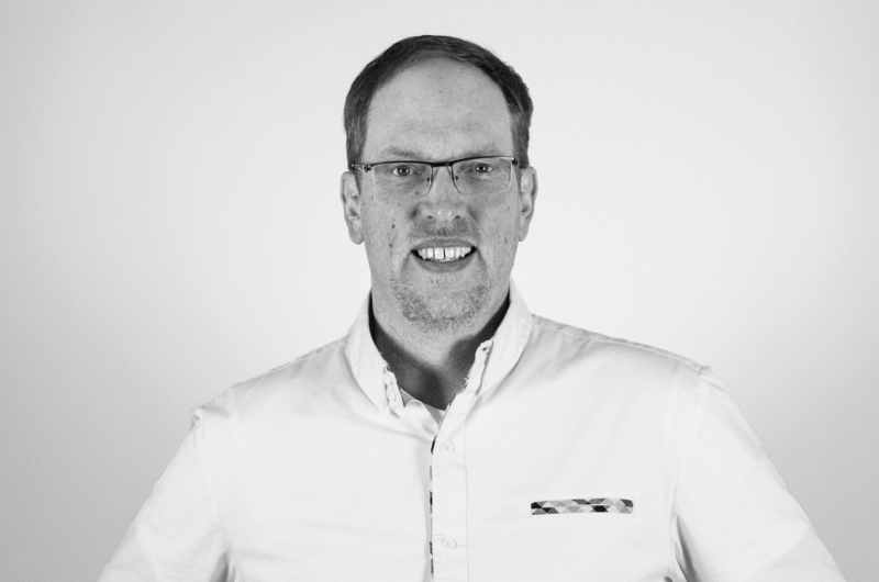 Black and white headshot of Austin Dahl